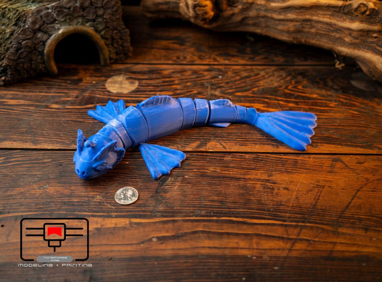 Articulated 3D printed Blue Sea Beast fidget toy