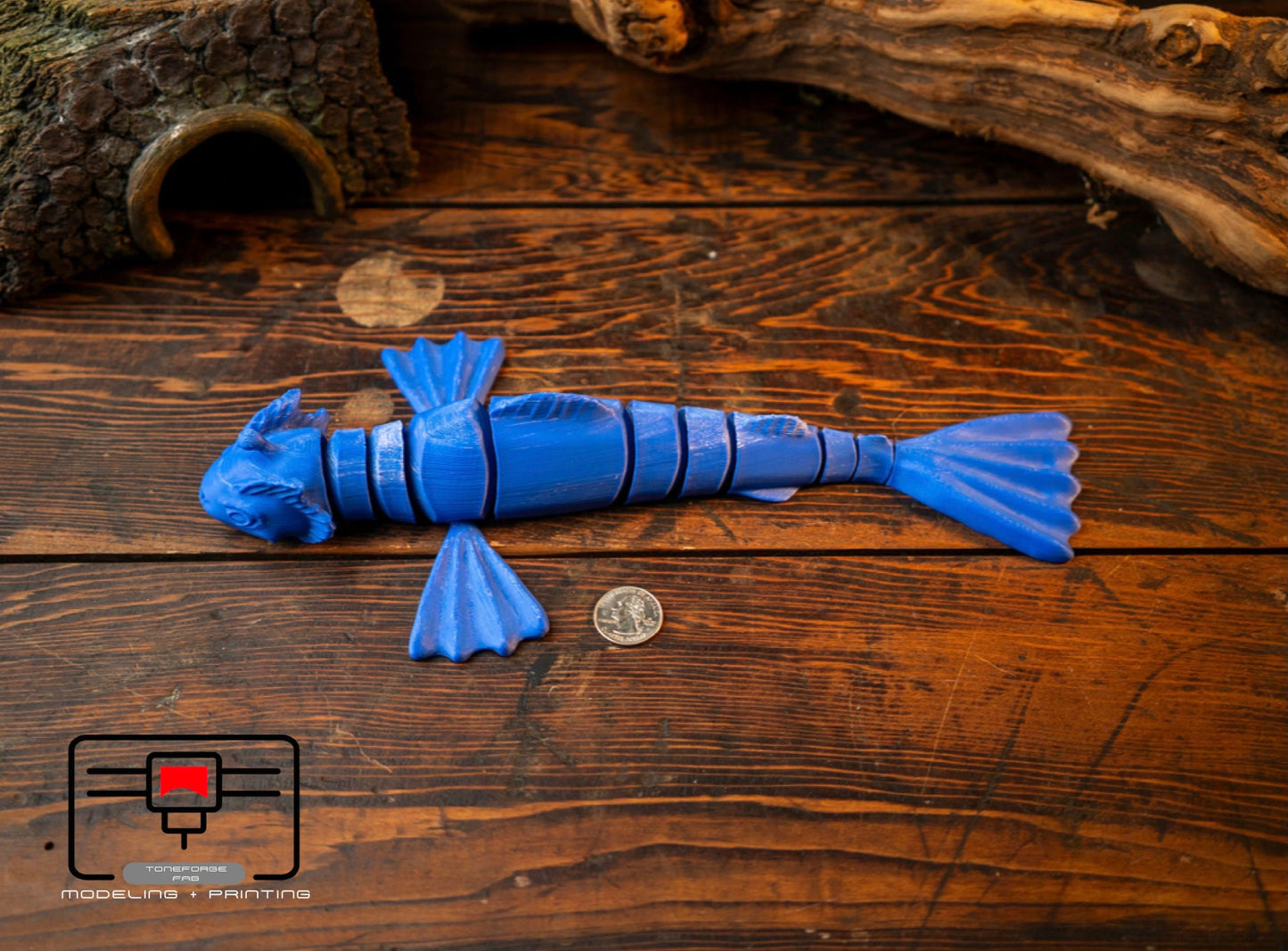 Articulated 3D printed Blue Sea Beast fidget toy